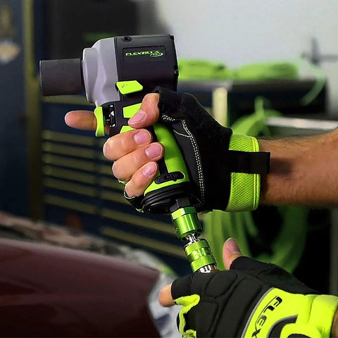 Flexzilla Pro High Flow Coupler & Plug Kit, 1/4in NPT, 14-piece; neon green and black pneumatic tool in use.