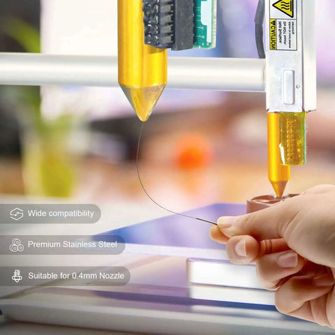 Person using Nozzle Cleaning Kit For 3D Printers With Brush And Pro Tools, operating on a 3D printer nozzle with a cleaning needle.