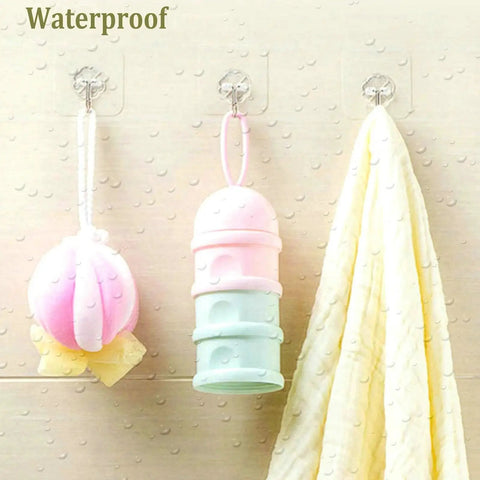 Heavy Duty Self Adhesive Hooks 33Lb Max Transparent Waterproof Wall Hooks holding bath items.