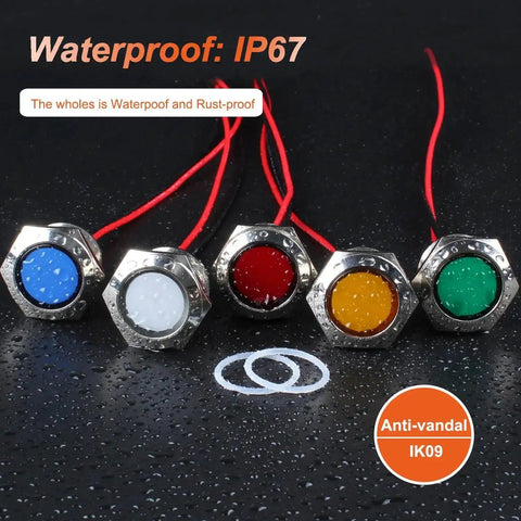 Five metal indicator lights in various colors with wires, waterproof IP67 and anti-vandal features, focus on center red LED.