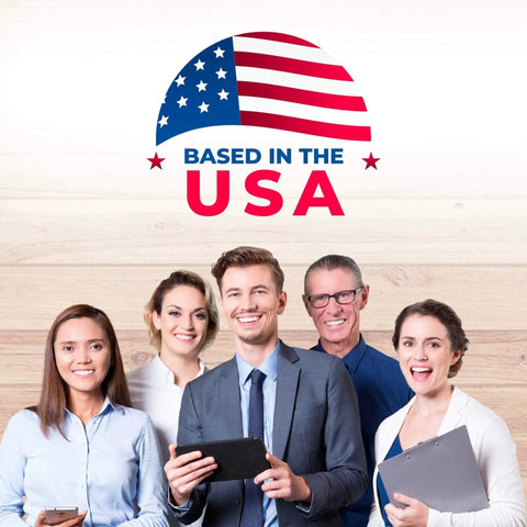 Group of smiling professionals with "Based in the USA" emblem above, showing American pride and teamwork.