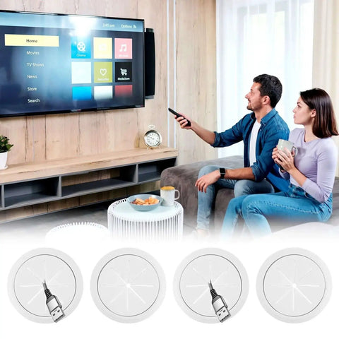 Couple watching TV with No More Cable Mess TV Cord Hider For Wall Mounted TV Kit With 4 Pass Throughs, showing cord management setup.