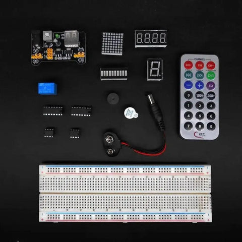 Ultimate STEM Electronics Starter Kit components including breadboard, sensors, remote, chips, and connectors displayed