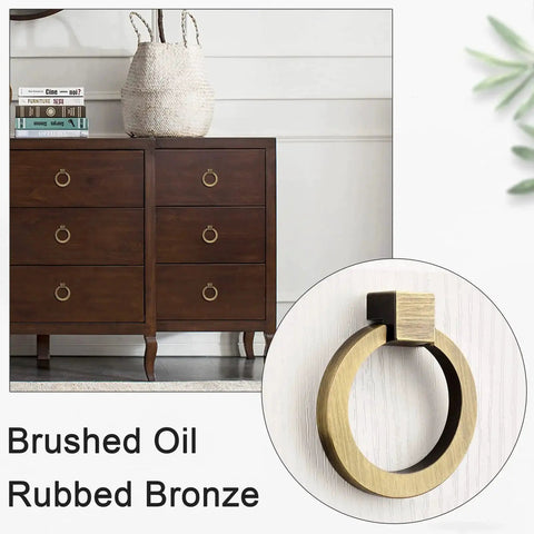 Brushed Oil Rubbed Bronze Cabinet Ring Pulls Set Of 4 In Zinc Alloy Dresser Handles with Single Hole Mount shown on dresser