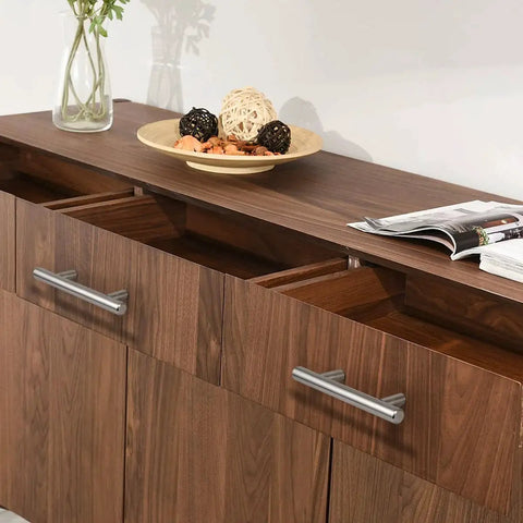 Set Of 25 Brushed Nickel Stainless Steel Cabinet Handles 2-1/2 Inch Center To Center 4 Inch Overall Length Modern Euro Style T Bar Pulls installed on wooden drawers