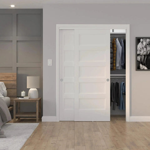 Richelieu Hardware 14660BC 60 Inch Bypass Door Hardware Kit in use with white sliding closet doors installed in bedroom