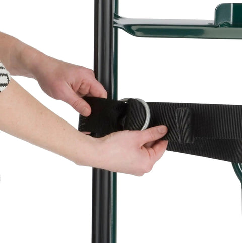 Close-up of hands adjusting the industrial strap on an Appliance Hand Truck 800 Lb Capacity With Industrial Strap Dark Green.