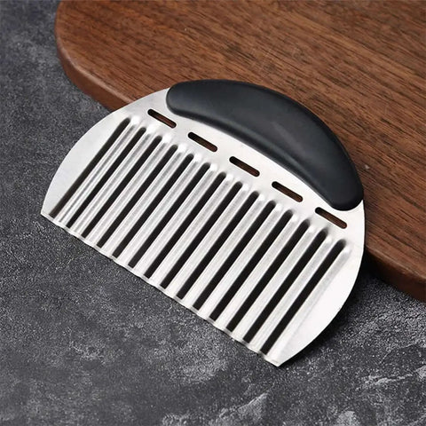 Crinkle Cutter For Veggies And Potatoes Stainless Steel Wave Knife with ergonomic handle, easy grip, resting on a wooden board.
