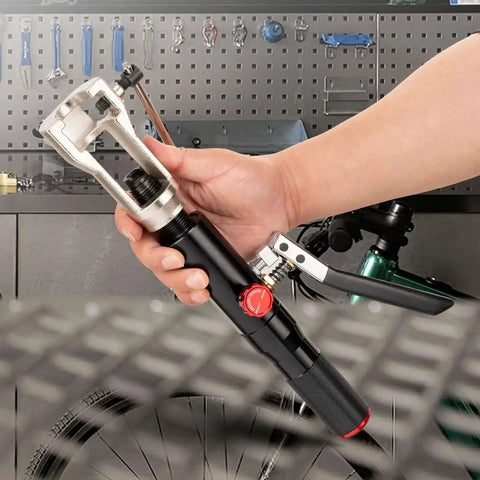 Hand holding All-in-One Hydraulic Brake Line Flaring Tool Kit for 3/16 to 1/2 Inch Copper and Steel Tubing in workshop