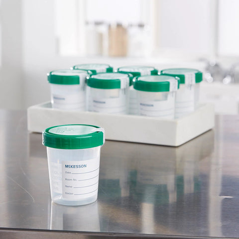 Specimen containers, 4 oz HDPE, sterile with green screw-on lids; McKesson label visible.