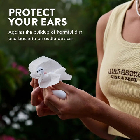 Person using Alcohol Free Hearing Aid Cleaning Wipes 100 Pcs Individually Packaged to clean an earbud
