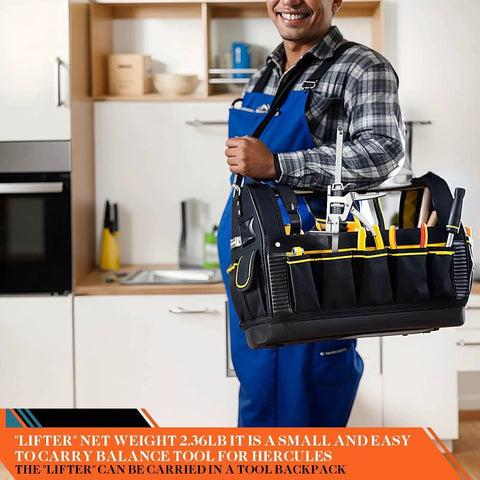 Man holding a tool backpack with various tools in a kitchen setting, wearing blue overalls and plaid shirt