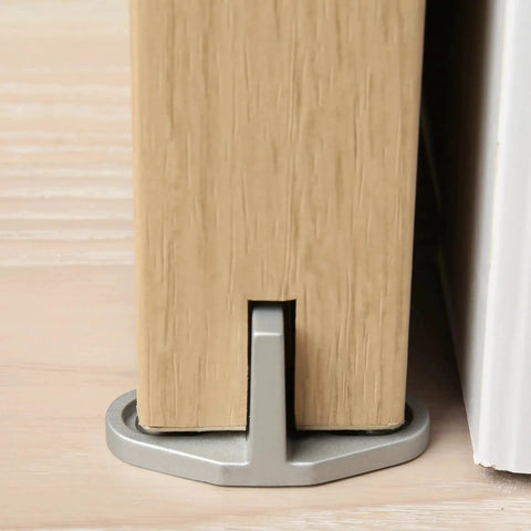 Sliding Barn Door Bottom Floor Guide with T Shape Design, floor mounted on wood, silver finish, installed view