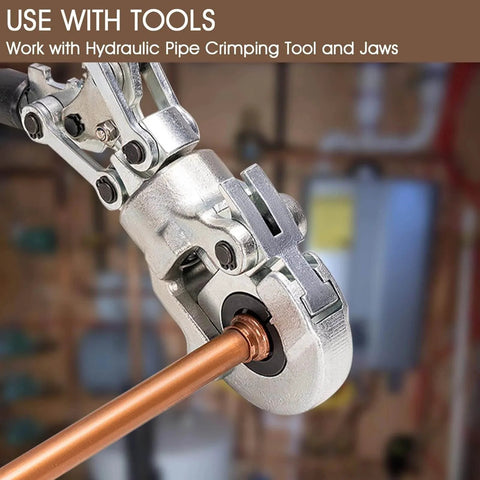 Close-up of Zero Lead Copper Press Fittings One Half Inch Copper Coupling being crimped with hydraulic press tool