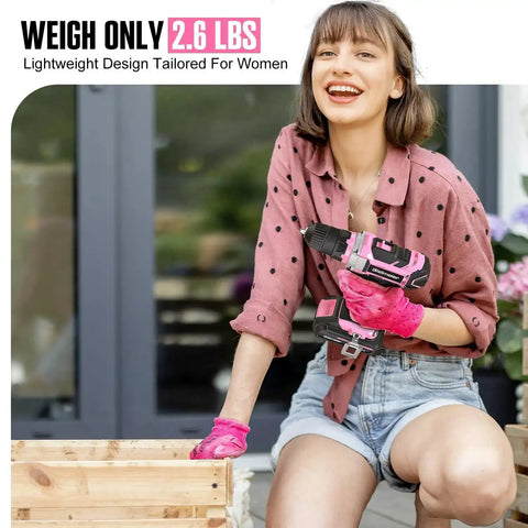 Woman using Pink 20V Cordless Drill Kit With 236 Piece Home Tool Set And Pink Carry Bag For Women Handy DIY Electric Screwdriver.