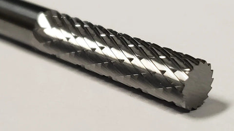 Close-up of One Fourth Inch Cylinder Double Cut Solid Carbide Burr SA-1L For Metalworking And Jewelry Making, showing carbide cutting edges.