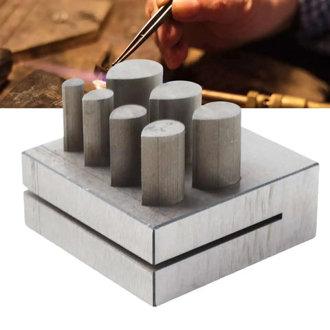 Shaped Punch Die Disc Cutter Set For Jewelry Making on workbench, featuring 7-piece 45 steel disc cutters with flat bottom.