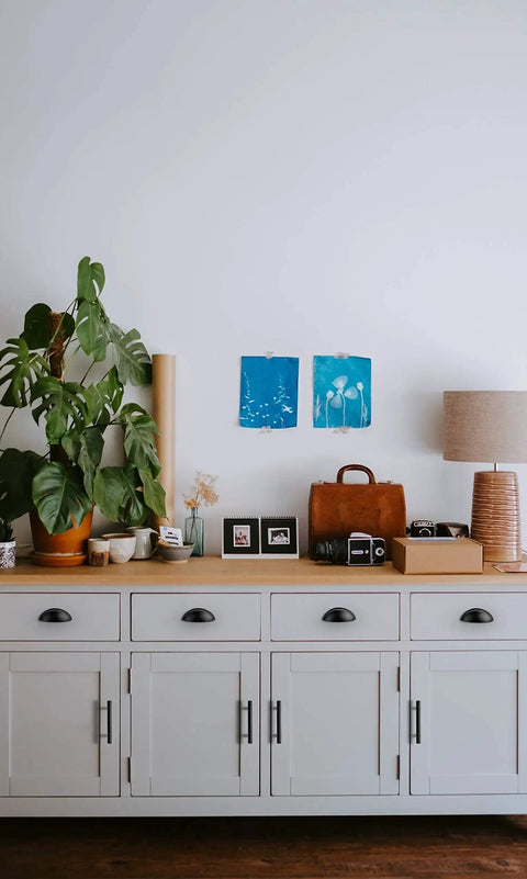 White cabinets featuring Twelve Pack Flat Black Cabinet Cup Pulls Three Eleven Sixteenths Inch Long One And One Quarter Inch Wide.