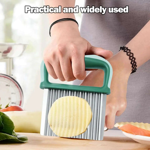 Crinkle Cutter Wave Slicer For Potatoes And Veggies Durable Stainless Steel Fry Cutter in use on potato with green handle