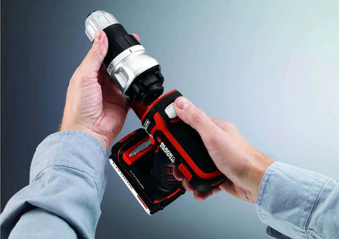Person holding a Black & Decker cordless drill with a magnetic drive guide, part of the Effortless 42 Piece Screwdriver Bit Set for home DIY projects.