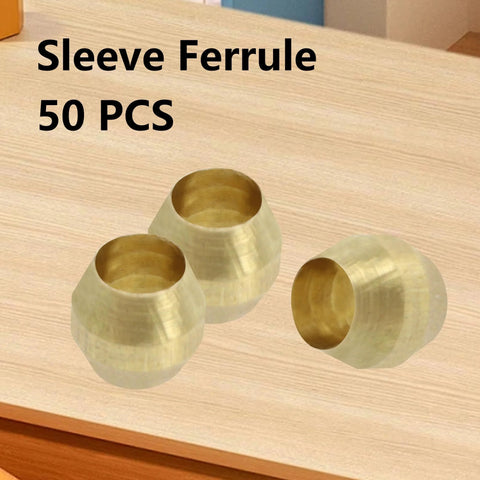 Brass compression sleeve ferrules, 1/8 in, three pieces on wooden surface