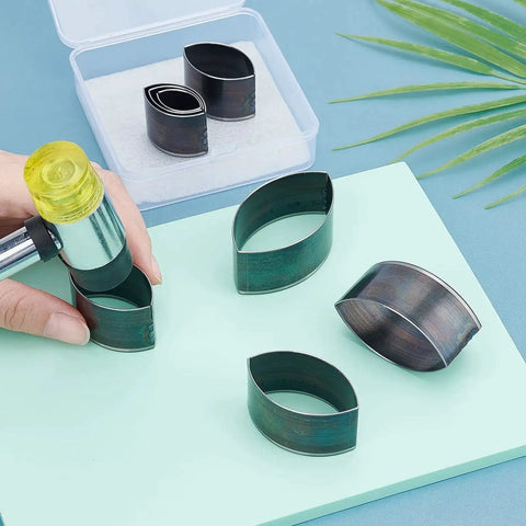 Leather Hole Punch Die Cutter Kit With Pro Grade High Carbon Stainless Steel Hollow Punches for DIY Crafts, fusiform pattern shown.