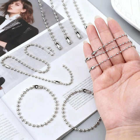 Hand holding Bulk 50 Pcs Ball Bead Chains 4.72 Inch Stainless Steel Ball Chain For Dog Tags Keychains And Connector Clasps