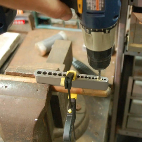 Drill in use with Pro Grade DIY-Friendly Portable Drill Guide For Straight Holes With 17 Drill Sizes on workbench