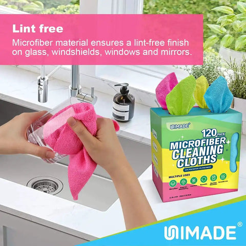 Person using a pink microfiber cloth from a 120 Pack Microfiber Cleaning Cloths For Cars And Home Use Reusable Towels 11x9 Multicolor With Crazy Handy Dispenser Box Scratch Free Lint Free Washable Rags For Detailing And Polishing to clean a glass jar in a kitchen sink.