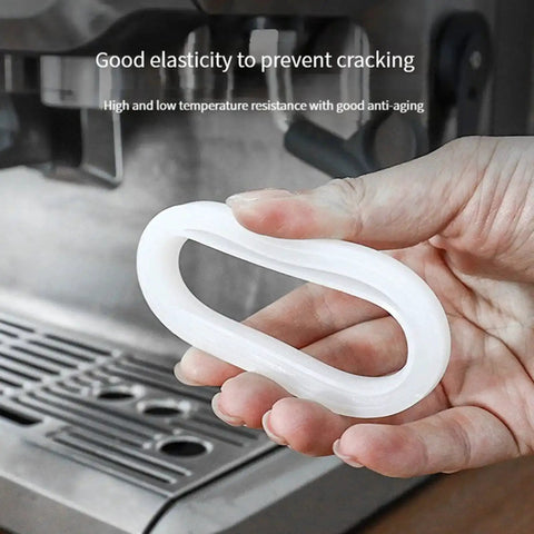 51mm Silicone Steam Ring Replacement for Espresso Machines held near Delonghi EC680 coffee maker