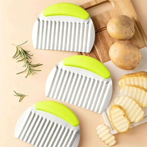 Crinkle Fry Cutter For Potatoes And Veggies With A Sturdy 0.6mm Stainless Steel Blade And Non Slip 13mm Handle, Easy Press French Fry Cutter For Home Kitchens, Makes Classic Wavy Fries And Home-Style Veggie Slices Green shown with crinkle-cut fries and potatoes.