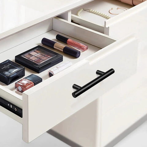 Drawer with makeup and 30 Pack Matte Black Cabinet Handles 5 Inch Length With 3 Inch Hole Center Stainless Steel Drawer Pulls installed