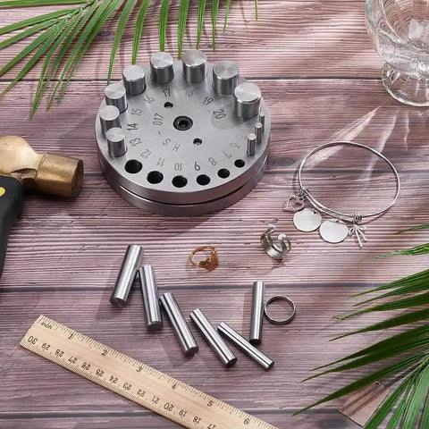 20 Size Steel Disc Cutter Set For Jewelry Making, Circle Cutter For Metal And Acrylic, tools and accessories on wooden surface