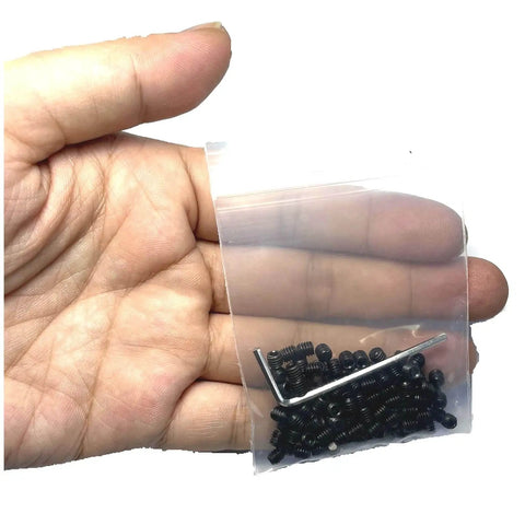 Hand holding a bag of Premium 110 Piece M4 X 4mm Set Screws In 304 Stainless Steel With Hex Socket Allen Head Grub Screws Includes M2 Allen Wrench 4mm Length Durable High Temp Humidity Resistant Hardware For Machinery And DIY.