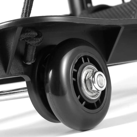 Close-up of wheel on Heavy Duty Folding Hand Truck With Four Wheels, Solid Construction Utility Cart For Luggage And Travel Gear, Black.