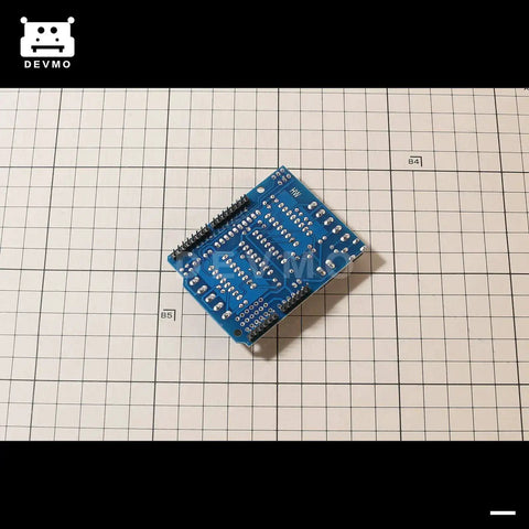 Arduino Compatible L293D Motor Driver Shield For Uno R3 Mega Duemilanove on grid surface