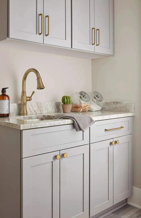 Champagne Bronze Cabinet Pull Five And Nine Sixteenth Inch Overall Length And Five And One Sixteenth Inch Center To Center Mounting on kitchen cabinets.