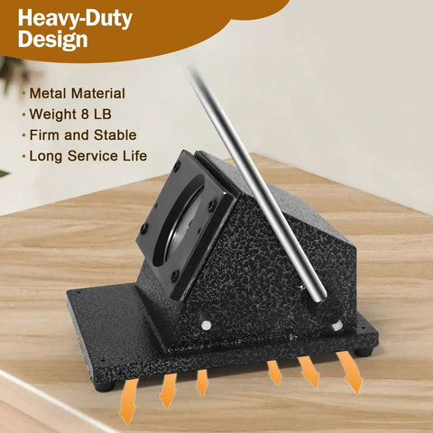 Heavy-duty metal 1.38 Inch Circle Paper Punch for button making, shown on wooden surface, black finish, side view