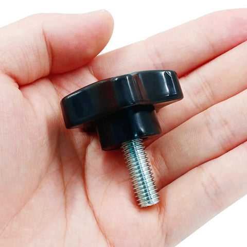 Star Hand Tightening Screw Knob M8x20mm Clamping Handle For Umbrella Base Black shown in a person's hand