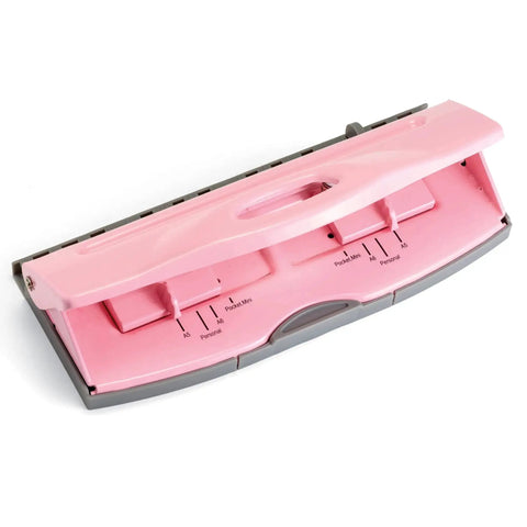 Adjustable 6 Hole Punch For Planners And Binders With 8 Sheet Capacity In Pink A5 Ready, shown laying on a white surface.