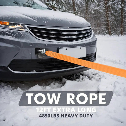 Tow rope attached to car bumper in snow, part of All In One Car Emergency Kit With Portable Air Compressor Jump Cables First Aid Kit And Roadside Safety Tools