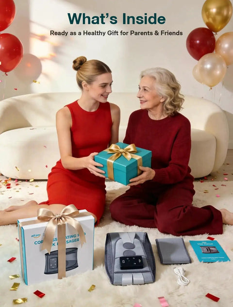 Two women exchanging a gift with 67 Inch Cordless Heating Pad For Back Pain Relief and packaging on the floor, festive setting.