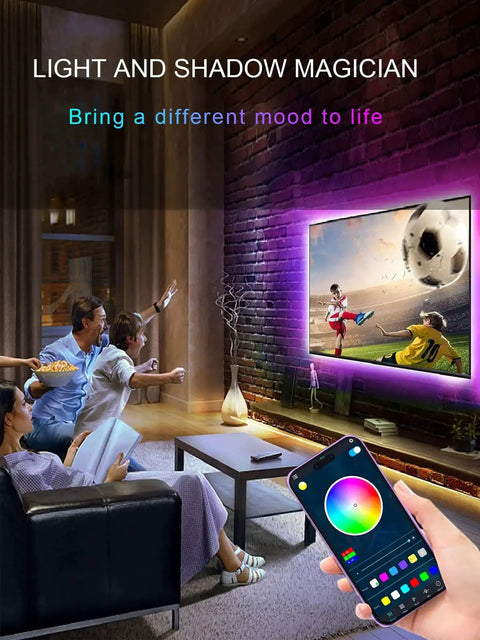 Family using 16.4ft RGB TV Backlight Strip USB Powered Bluetooth App Control And Remote in living room, TV glowing with purple light