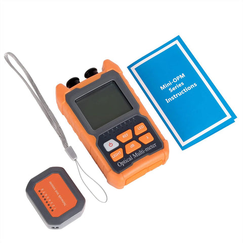 Orange portable optical power meter with LCD screen and keypad; includes remote module and instruction manual.