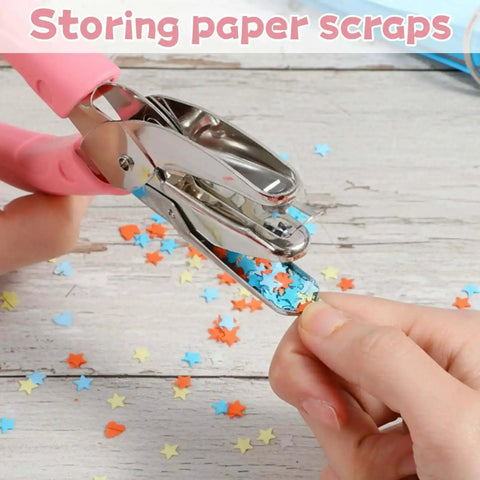 Pink Star Shaped Hole Puncher Five Millimeter With Rubber Grip Handle cutting star shapes for crafting and scrapbooking projects