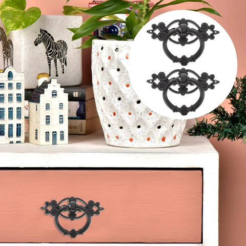 Antique Ring Handle Drop Pulls 2.56 Inch Cabinet Hardware on a pink dresser, decorative zinc alloy vintage style for wardrobes and drawers.