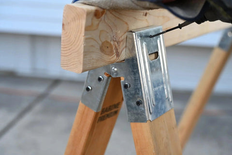 Galvanized 2x4 Sawhorse Brackets Set Of 4 for durable sawhorses on 2x4 lumber, ideal for woodworking and construction, close-up view