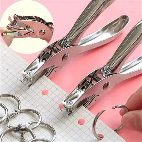 Metal Handheld Hole Puncher With 3Mm And 6Mm Circular Holes, punches A4 paper, shown with binder rings, steel build tool for office