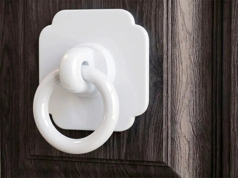 Four Pack Satin White Cabinet And Bifold Ring Pull Handles With One And Three Fifths Inch Backplate installed on wood cabinet door