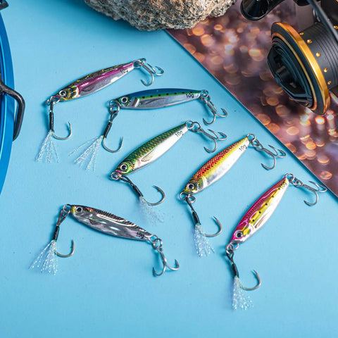 Lead Vertical Saltwater Jig Lures Set Killer Pro Grade With Assist Hook And Treble Hook For Tuna Salmon Striped Bass Grouper Kingfish 15g 6 Pack Jigging Spoon Lures Realistic 3D Laser Coated Finish on table